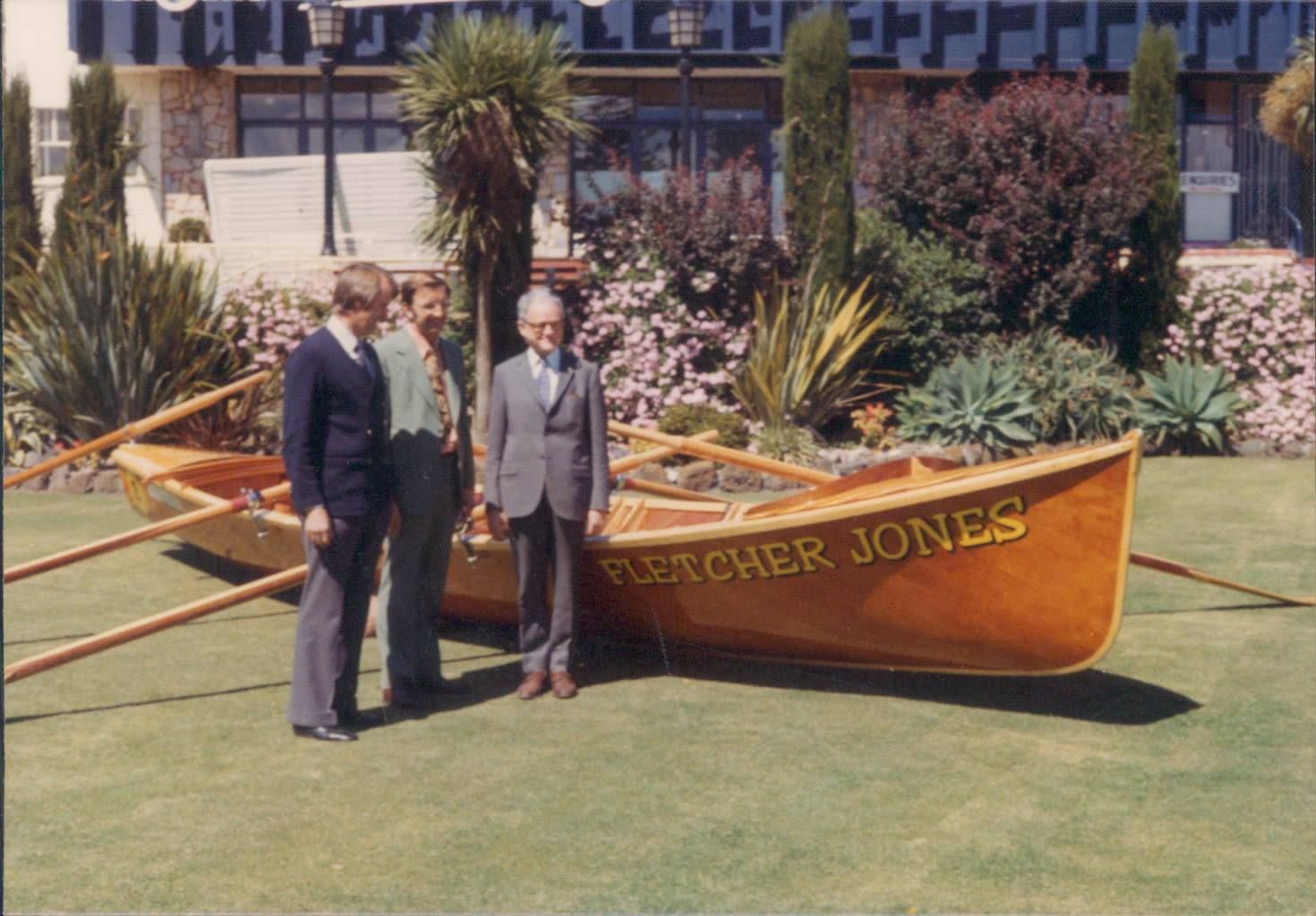 L-R David Jones, Bruce Owen and Neil Symons with the Fletcher Jones surfboat early 1960s. The boat has now been fully restored and is on display at the Warrnambool Surf Club. Photo: shared by David Owen 