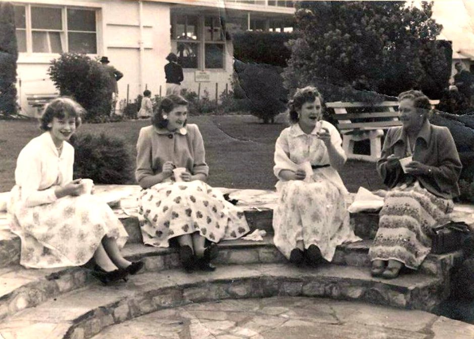 Clarice Doman (Adams), Jeanie Dunne, Evelyn Irving (Adams) and Annie Adams enjoying a cuppa in the FJ gardens at one of the Christmas parties, mid 50’s.  Annie worked in kilts, while her daughters Clarice and Evelyn worked in trousers with Jeanie.    Photo shared by Ros Doman.  