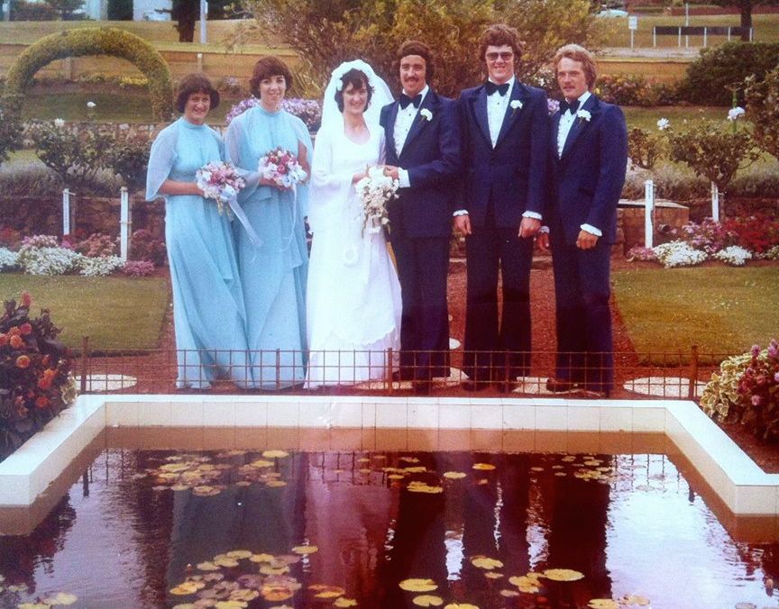 NOT the bridesmaid who fell in the pond! Photo of Glenda McGennan's bridal party in front of the pond in the FJ gardens.  