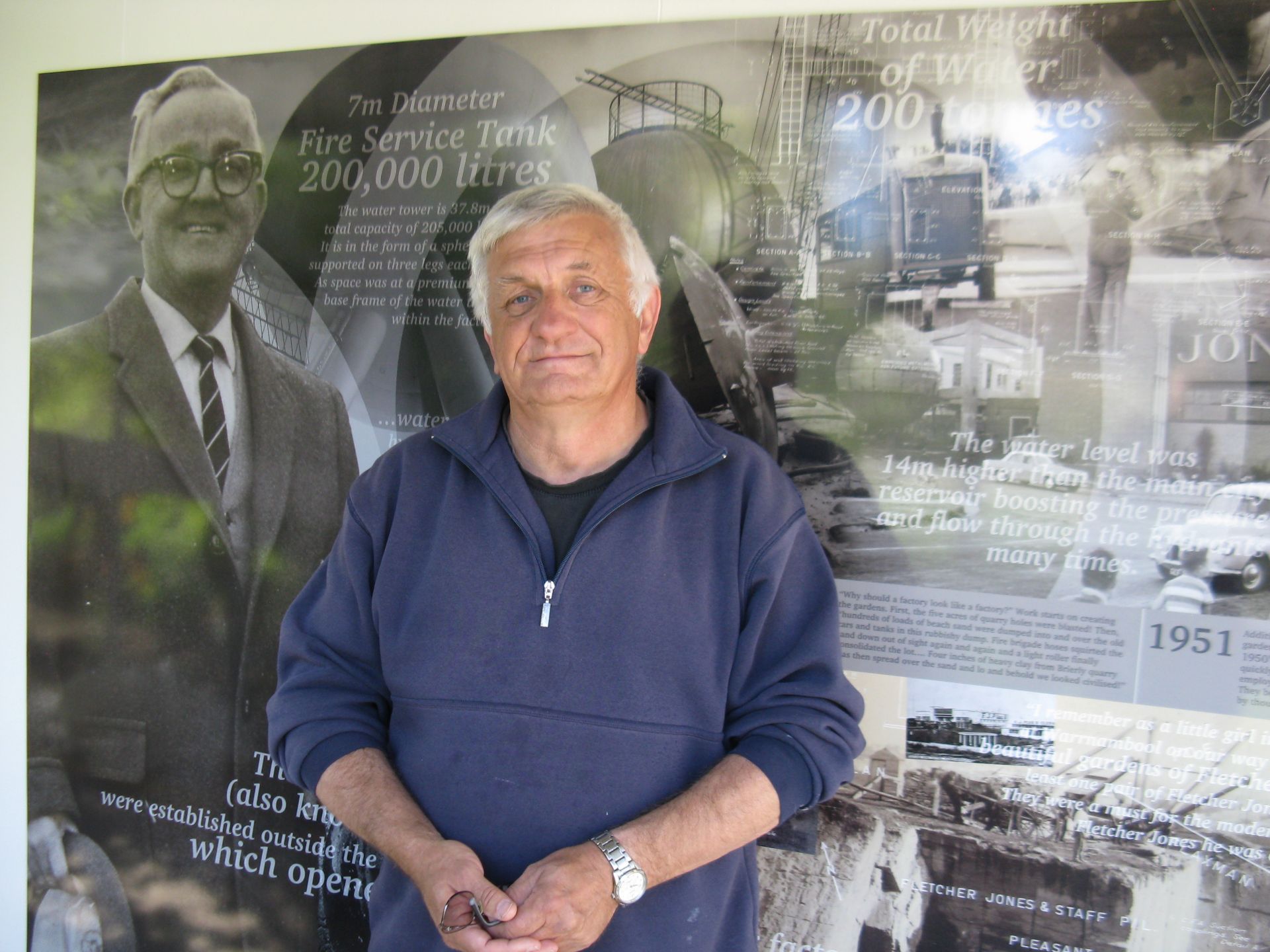 Mark Rashleigh in front of the beautiful FJ Story panel he designed. The photo is taken  just after it's unveiling at the 2015 FJ Christmas Party. Photo:Colleen Hughson 