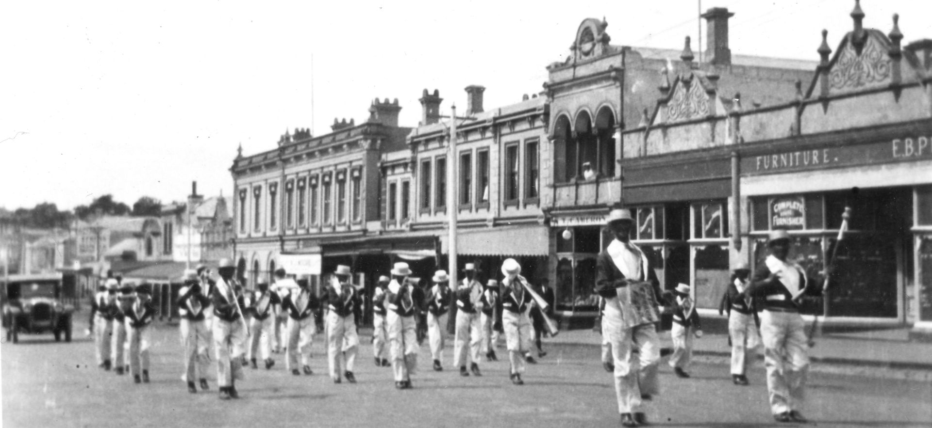 Black faces in a depression parade in Warrnambool - perhaps a clue to the photo of FJ and staff with black faces?  Photo: Jones Family Collection.  
