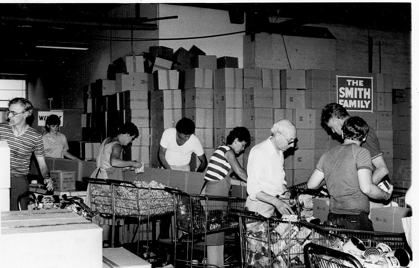 FJ Sydney Staff pack Christmas parcels for the Smith Family.  Photo: Jones Family Collection 