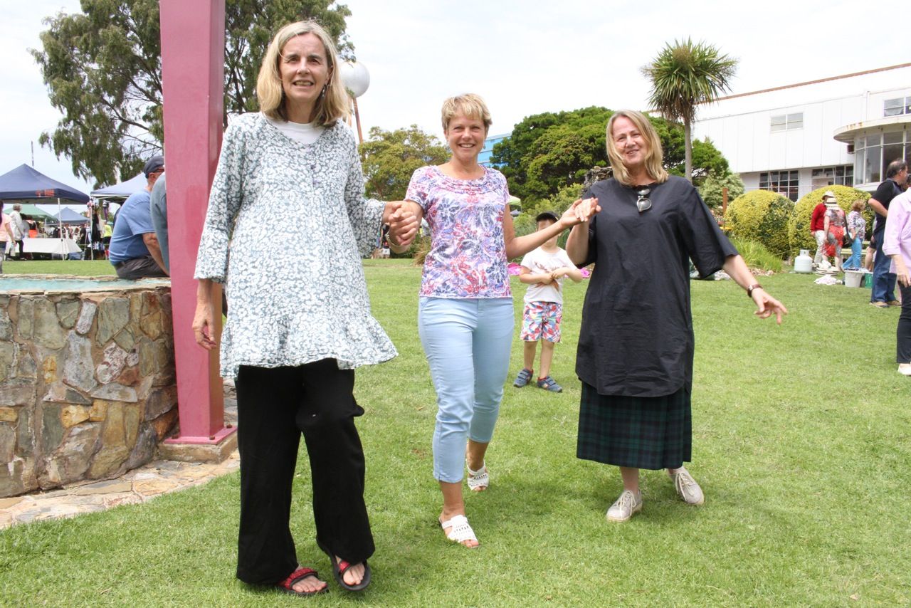 Grandchildren of Fletcher Jones - Anne Jones, Rena Cotter (nee Jones) and Susan Jones strike a similar pose as they did as children in 1961 by the wishing well - this time in 2015 at the F Project Community Christmas Party in the FJ gardens! 