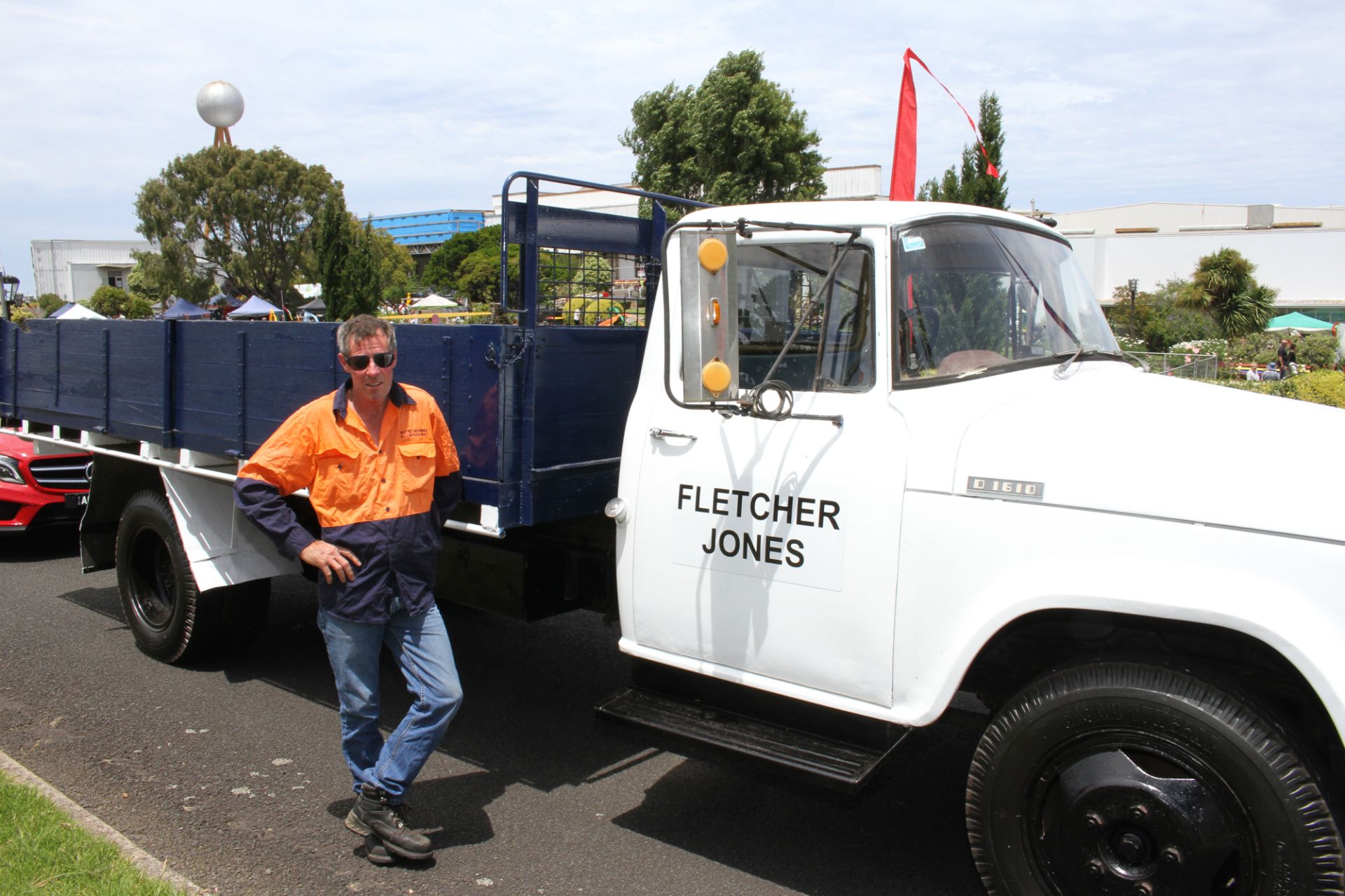 Gary with the same truck spruced up and parked outside the 2015 community picnic in the FJ gardens.   Photo: Colleen Hughson
