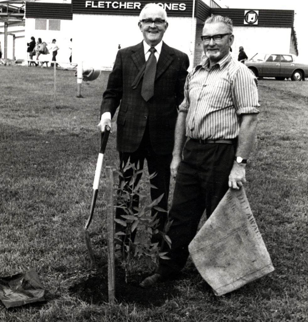 Fletcher Jones and Dick Tongue planting a tree at the Mt Gambier factory, 1972.  Photo: Jones Family Collection 