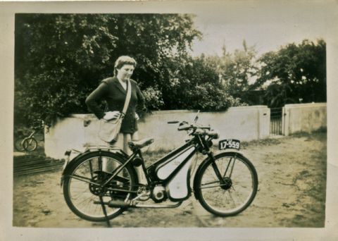 Claire with the two stroke motorbike she rode to work at FJs in the 50s.  Photo: Claire Doecke album