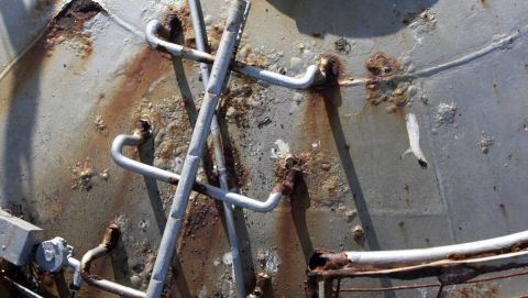 Workmen from Keppel Prince removed the old rusted ladder from the bottom to top and painting rust affected areas in 2010: image Warrnambool Standard