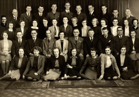 Early Fletcher Jones Staff Photo with Betty Rust sitting to the left of Fletcher Jones second row and fifth from the left. Shared by Wilma Williams  