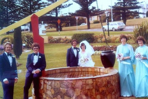 Glenda McGennan with bridal party in the FJ gardens