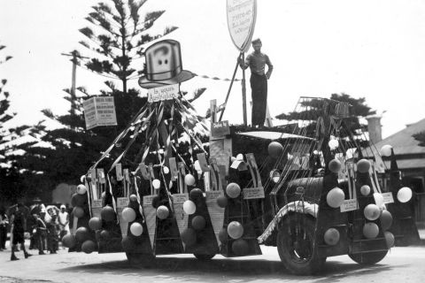 Depression era parade in Warrnambool with Fletcher Jones float topped by a hat asking "Is yours Australian?"  Photo: Jones Family Collection