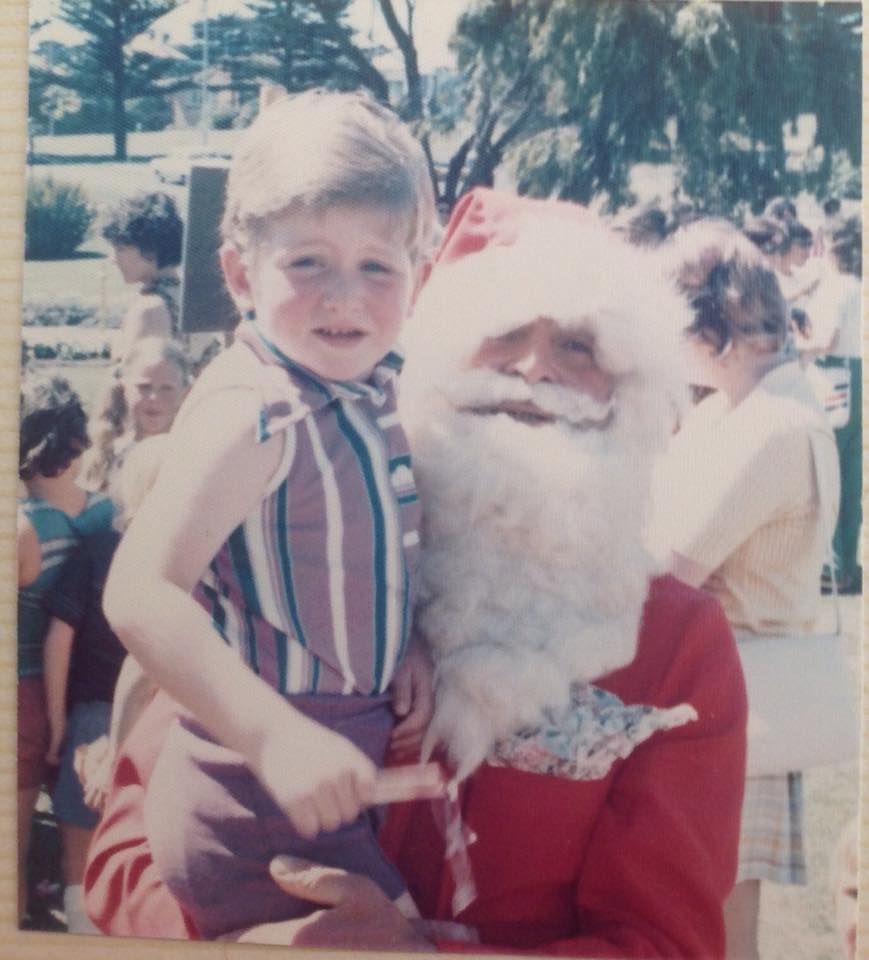 FJs Christmas Party 1974 photo from  Peter Joseph Stapleton Santa with 3year old John Stapleton 
