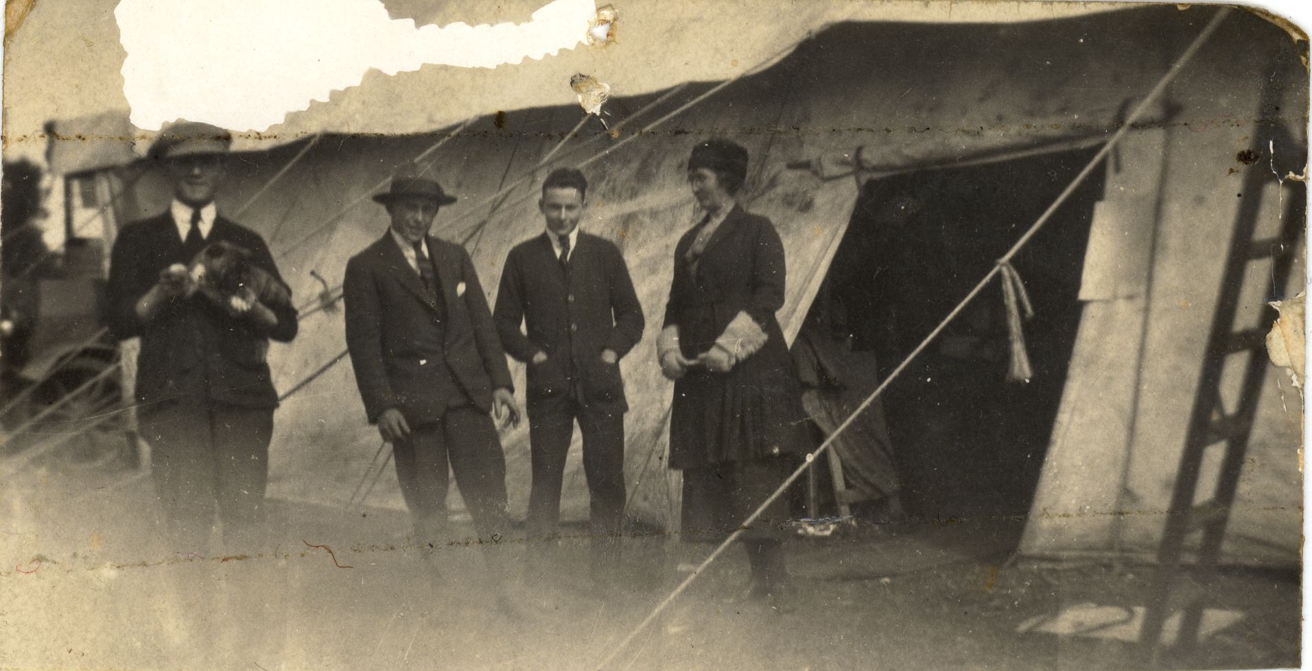 FJ left with Digger the dog and other staff by the marquee.  Photo: Jones Family Collection 