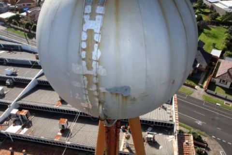 Workmen from Keppel Prince removed the old rusted ladder from the bottom to top and painting rust affected areas in 2010: image Warrnambool Standard